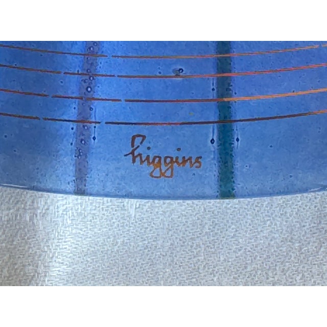 Striking mid-century modern glass charger by artisan designers Michael and Frances Higgins, circa 1950s. This monumental...