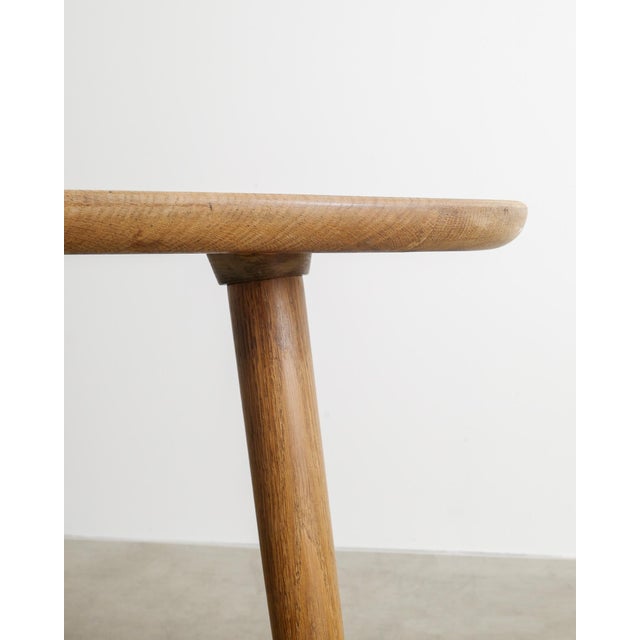 A rare three legged danish mid century free form shaped wooden coffee / console table in oak produced in denmark by an...