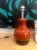 Rowan-colored ceramic lamp base with wooden base from the 70s. European Plug (up to 250V).The wiring of this item may be...