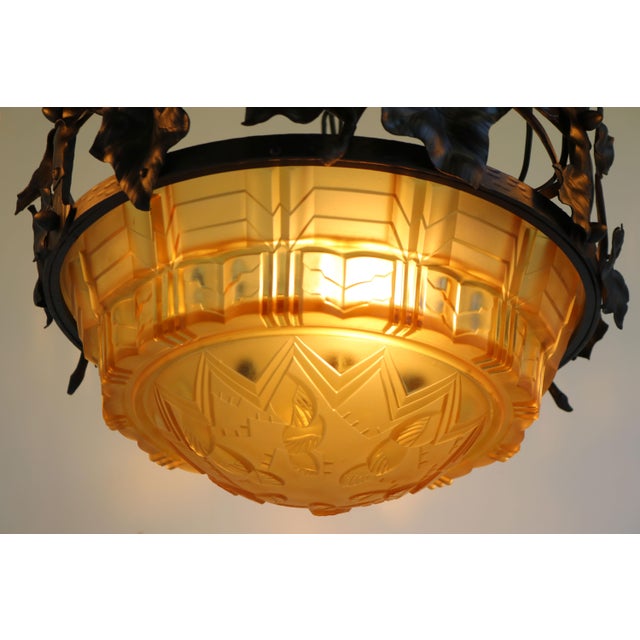 Breathtaking & Impressive! This antique French Art Deco Chandelier in Wrought Iron & Geometric Glass 1930. The wrought...