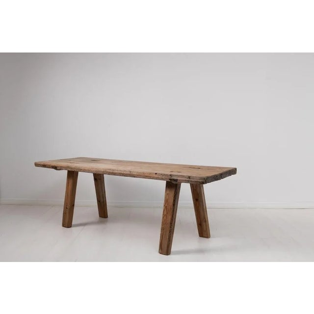 Folk Art country table in from Northern Sweden. The table is elementary and rustic and made during the late 1700s. Hand-...