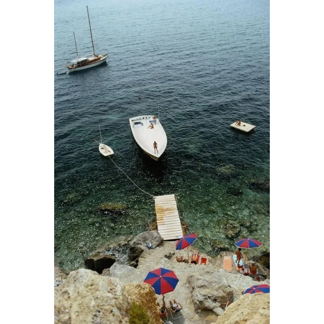 Porto Ercole 1973 A Magnum motorboat belonging to Count Filippo Theodoli arrives at the private jetty of the Il Pellicano...