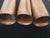 Vintage set of three graduated pillar style candle holders created in copper in the 'Brutalist' style by American...