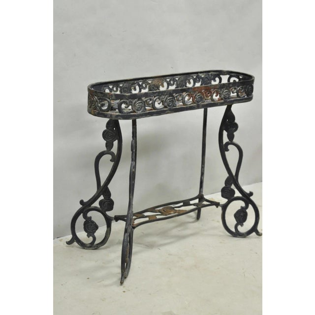Vintage French Art Nouveau Style Heavy Wrought Iron Garden Planter Plant Stand. Circa Mid 20th Century. Measurements:...