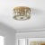 Enhance your living space with the elegant PARDA flush mount. This 12 inch masterpiece features a harmonious blend of...