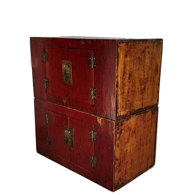 Adorn by well aged rich red color, lovely patina and texture, this pair early 19 century trunks can be stacked on the top...