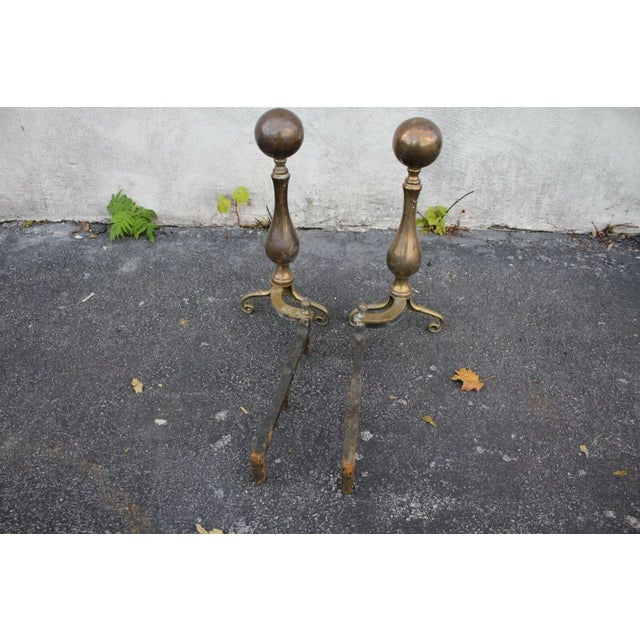 Enhance the elegance and historical charm of your fireplace with this exquisite pair of Regency style andirons, dating...