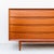 Iconic and expertly restored eight drawer teak lowboy dresser or credenza from Arne Vodder’s “Triennale” collection, made...