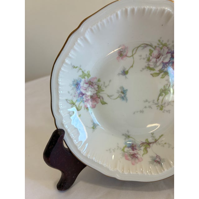 Set of six vintage Theodore Haviland New York bowls in the Annette pattern, featuring delicate floral sprays and a gold...