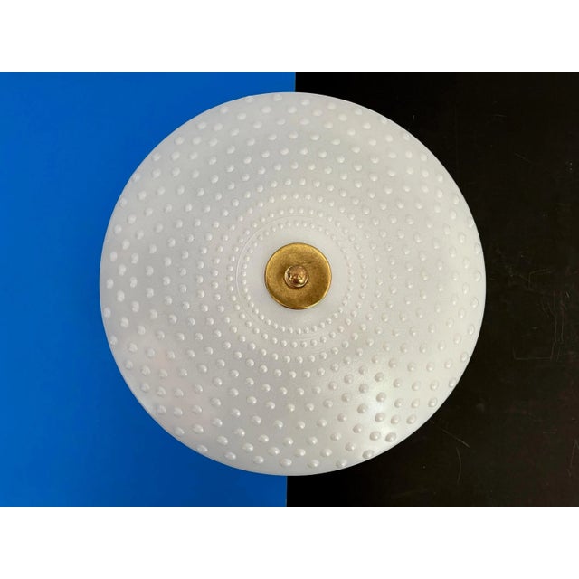 Stunning mid century hobnail glass semi-flush mount ceiling light in a matte white finish with radiant dimensional...