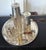 A sterling silver coffee service set consists of six pieces: a coffee pot, a chocolate pot, a covered sugar bowl with a...