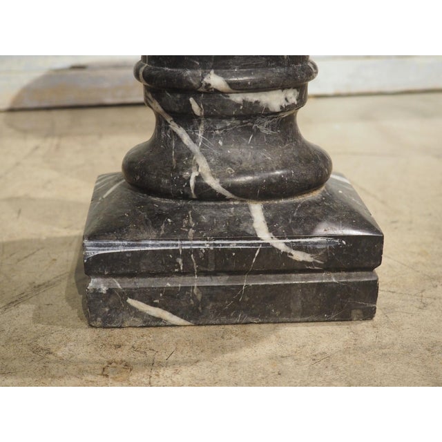 More information coming soon… Dating to circa 1850, this pair of table vases was hand-carved in nero marquina marble. The...