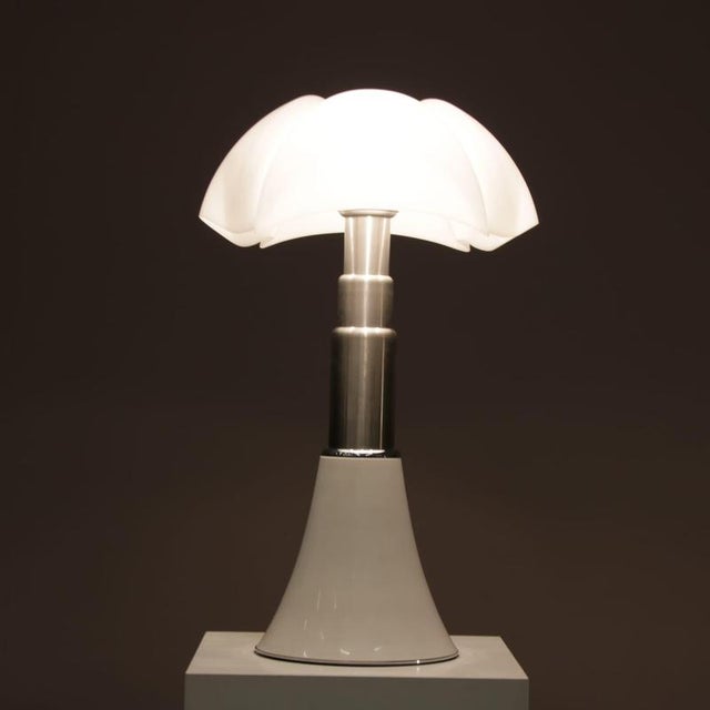 A beautiful large “Pipistrello” table lamp designed by Gae Aulenti, manufactured by Martinelli Luce in Italy in the 1970s....