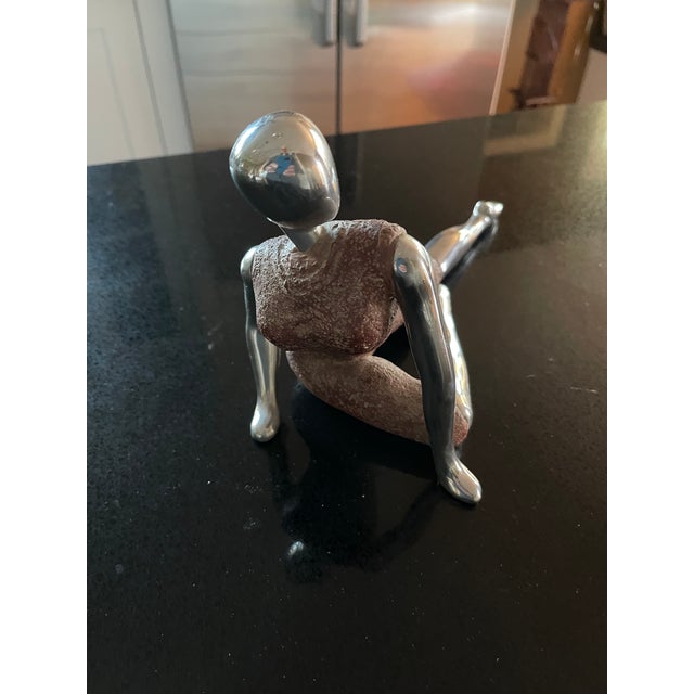 I've owned this statue for many years 25+ and purchased it in Upstate New York near Woodstock. Just love the architectural...