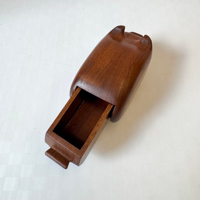 A wonderfully charming vintage teak pig box. Handcrafted and beautifully finished with a slide out drawer, perfect for...