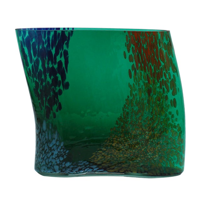 This expressive handblown glass vase was crafted in Murano, Italy, in the 1970s and showcases the bold, organic spirit of...