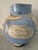 Very cool studio handmade vase in beautiful shade of blue decorated with nudes. Artist's signature at base. A great look.