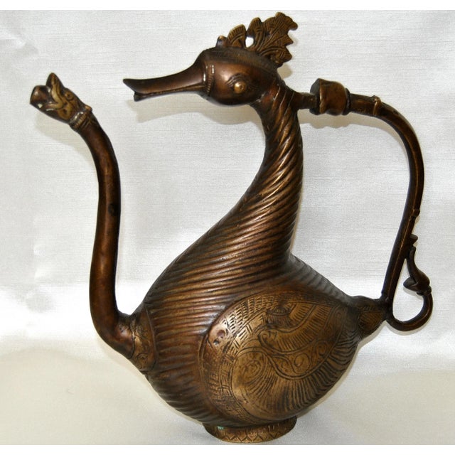 Ewer in the Shape of a Goose or Swan, Mughal India or the Deccan Empire, 19th century. Bronze, piece cast, engraved. The...