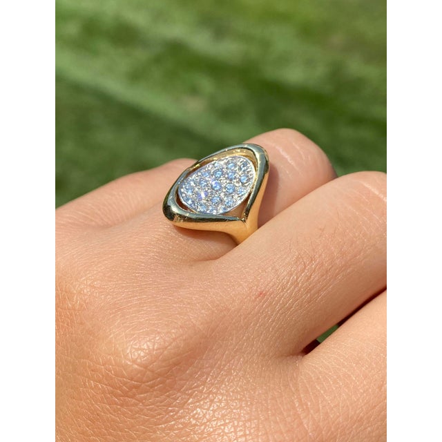 The Tyler Road: Mid Century Modern Two Tone Diamond Ring. Our exquisite oval-shaped white gold diamond ring is a stunning...