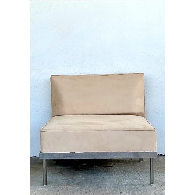 Defined by sleek geometric lines and a low-profile architectural silhouette, this vintage modernist armless slipper lounge...