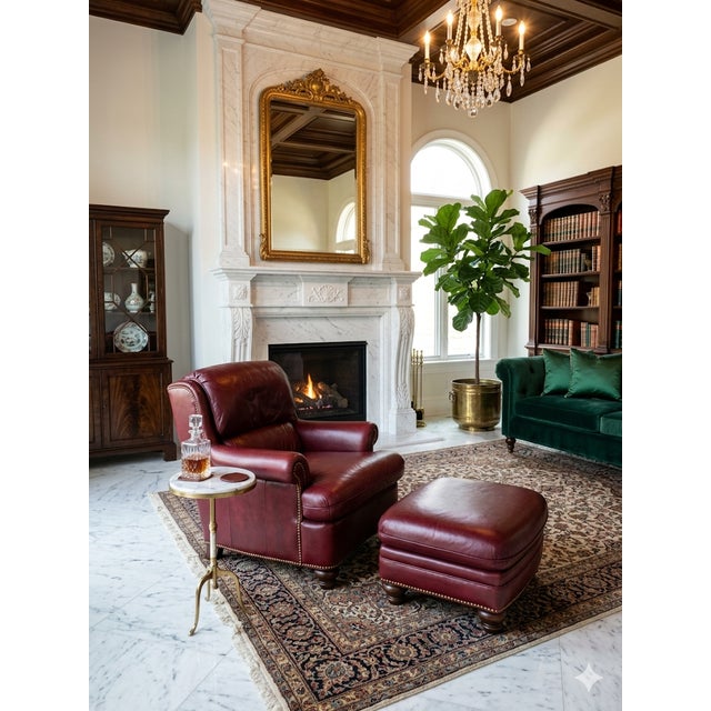 The Hancock and Moore Nail Head Leather Chair and Ottoman set is a traditional, handmade piece from 1978. This square-...