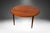 A beautiful Mid Century Modern round coffee table by Peter Hvidt & Orla Molgaard-Nielsen and produced by France & Son...