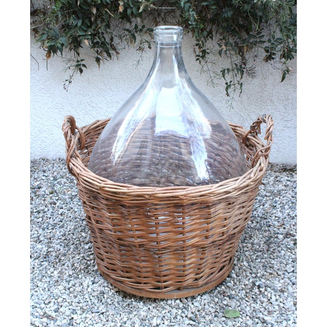 Extra Large 22" rare antique French Vino bottle, and rattan basket carrier with bottle cover. Used throughout Europe to...