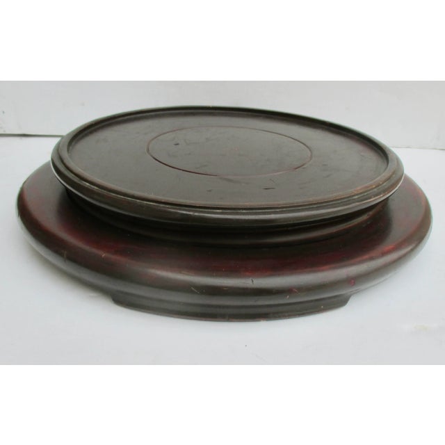 Massive mahogany fishbowl stand. Likely American in mahogany that is turned in two sections to control the splitting or...