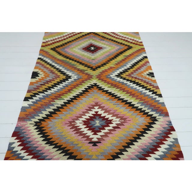 This beautiful rug from the west of Turkey Denizli Nomads. Handspun Pure Wool.Kilim rug hosts an intriguing pallet of...