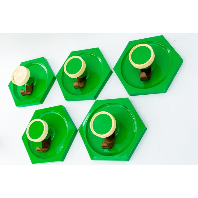 You will get the 5th too but the one green piece on top is missing. Original condition