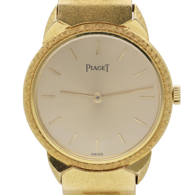 Vintage Piaget reference 924 watch in 18K yellow gold, 24mm case, circa 1971–1972, featuring a champagne sunburst dial...