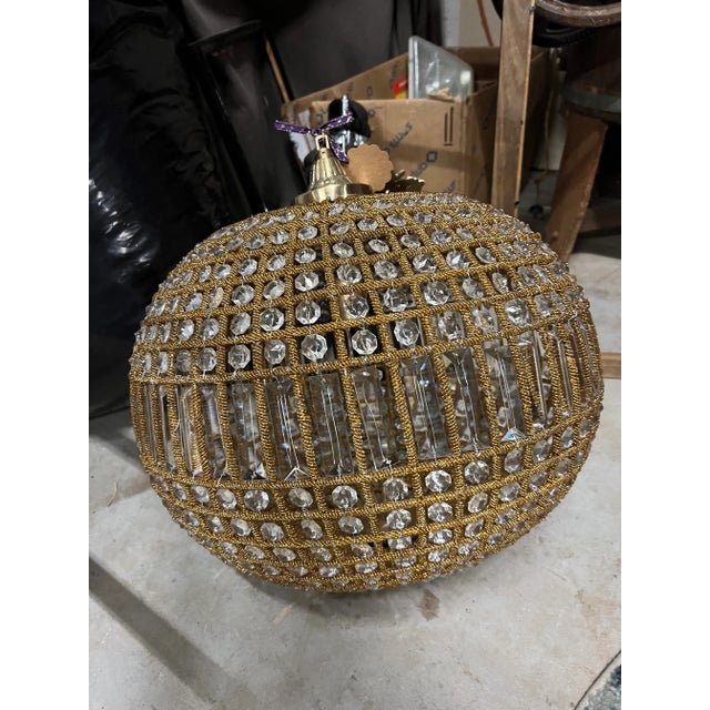 This stunning gold chandelier is definitely a statement centerpiece perfect for any decor! Designers are going to fall in...