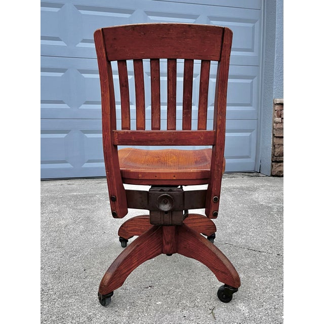 Gunlocke Vintage Solid Oak Banker's or Typist Office Chair on Casters | Gunlocke Style For Sale - Image 4 of 12