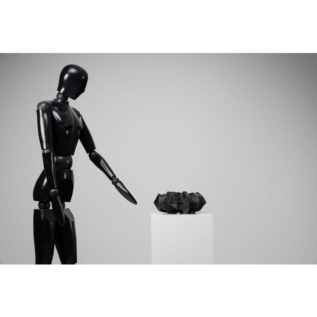 The Rock Box, designed by Studio Job in 2002 and cast in solid bronze in 2013, is a striking sculptural object that merges...