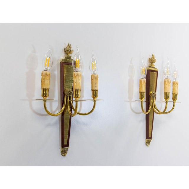 French wall triple sconces pair of lights brass and iroko in the louis xvi style. Very good condition made circa 1960 wear...
