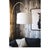 The juxtaposition of a metallic, adjustable base with a fabric shade gives this floor lamp a modern aesthetic—seamlessly...
