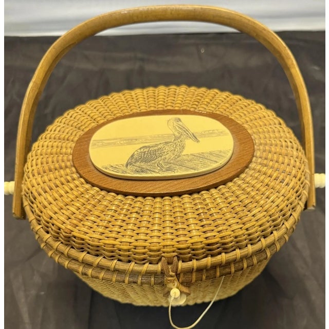 The Farnum Nantucket Lightship Pelican Ivorylite Handbag Basket Purse from 1988 is a unique and stylish vintage accessory....