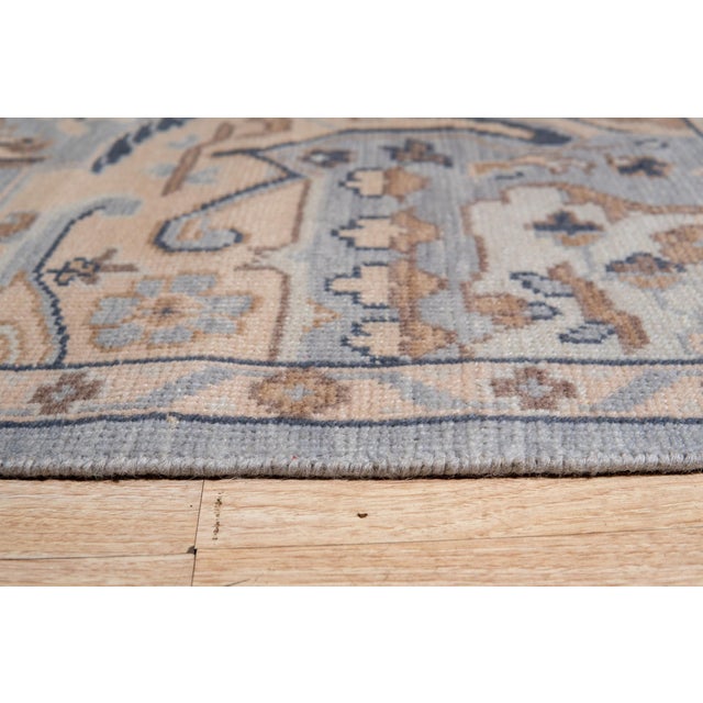 Unique Comfortable Blue Hand Knotted Wool Rug, Country of Origin: India. This exquisite piece showcases the exceptional...