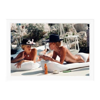 Contemporary Sunbathing in Antibes 1976 by Slim Aarons White Framed C-Print For Sale