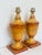 A pair of classic Italian, wooden table lamps. These are hand painted and hand decorated by renowned Dutch “House of...