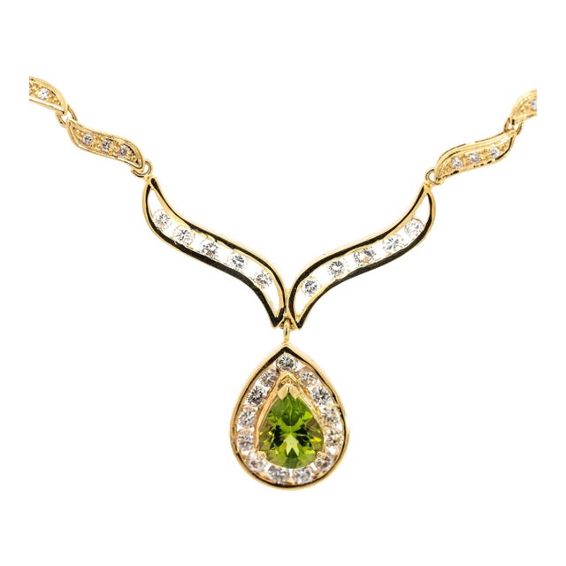Vintage Pear Cut Green Peridot Drop Pendant Necklace with Diamonds in 18K Yellow For Sale