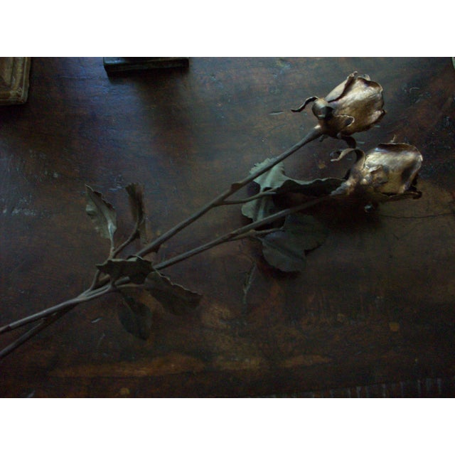 A rose that will not wither in a few days. This iron rose was hand forged by a fellow artist in Europe and then finished...