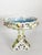 These are the dimensions of a single plate. Elegant German porcelain centerpiece dating from the 19th century, featuring...
