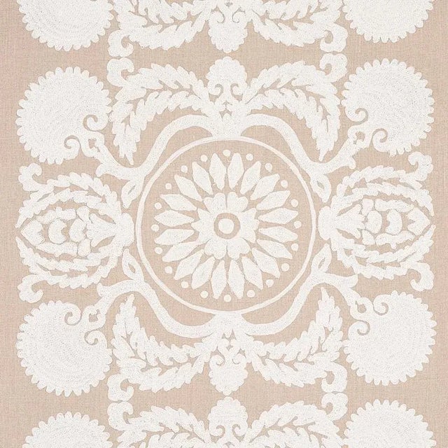 This captivating large-scale design has stylish drama and folkloric charm, with an intricately embroidered pattern that...