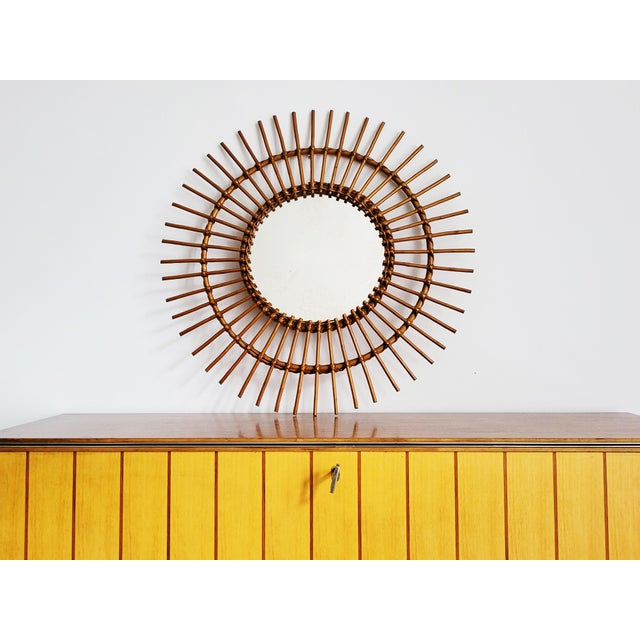 1950s Italian Sunburst Mirror Glamorous, handcrafted wooden rattan sunburst mirror from Italy in the 1950s, in good...
