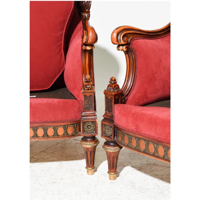 Lovely pair of French Louis XVI style armchairs with vintage velvet like upholstery. This beautiful pair of chairs feature...