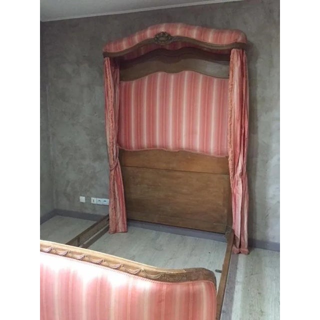 Beautiful and rare louis XV style with style baldaquin and louis XVI in 20th century French walnut. The bed is lined with...