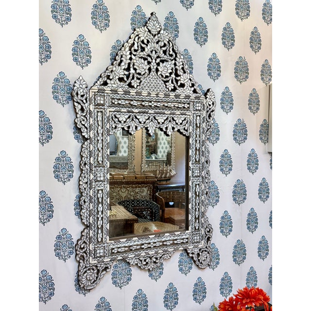 Outstanding white mother of pearl inlaid – sinuous lines, elaborate arabesques and lustrous mother-of-pearl inlay – are...