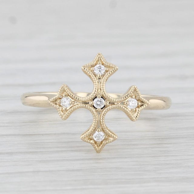 Gemstone Information: - Natural Diamonds - Total Carats - 0.06ctw Cut - Round Brilliant Color - G - H Clarity - VS2 Metal:...