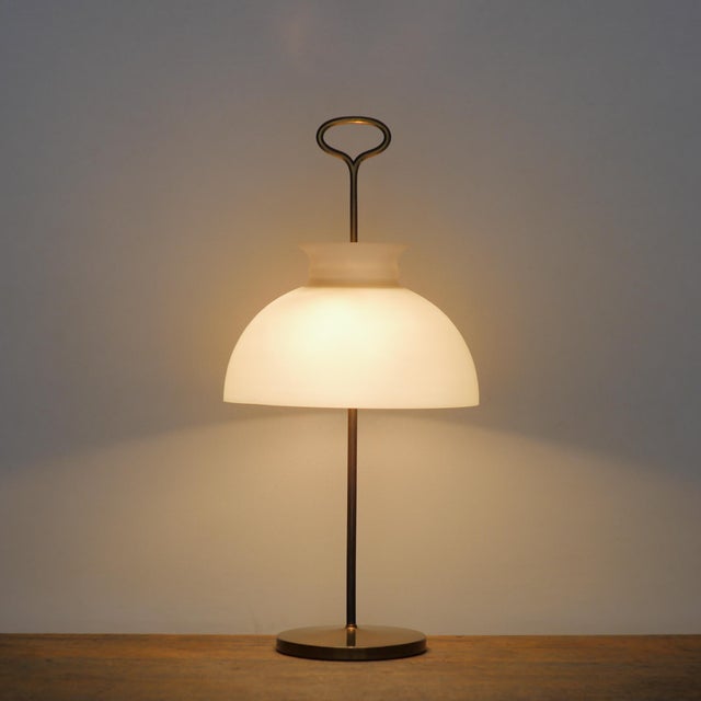 A large "Arenzano" table lamp. First Series. Made in Italy by Azucena. Designed by Ignazio Gardella. 1956. Brass frame and...